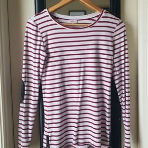 Red and white striped long sleeve with black elbow